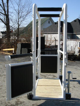 EquiGym Portable Stocks with wheels up ready to load horse